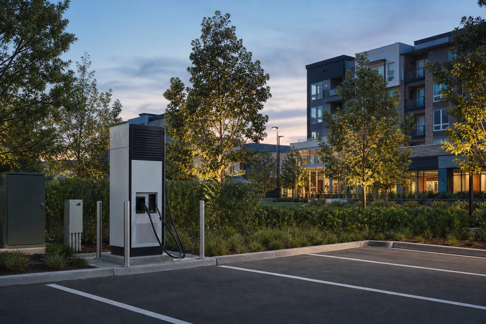 Low-noise EV charger installed near a residential and retail area